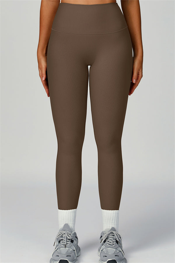Fitglutes activewear set with a sports bra, jacket, and leggings, designed for gym and workout activities.