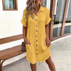 Women's casual FitiqueFit loose short-sleeve midi shirt dress with button-down front, displayed hanging on a wooden hanger.
