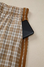 Casual plaid print pants with tie detail from Plush Fashion Hub, featuring a relaxed fit and stylish pattern.