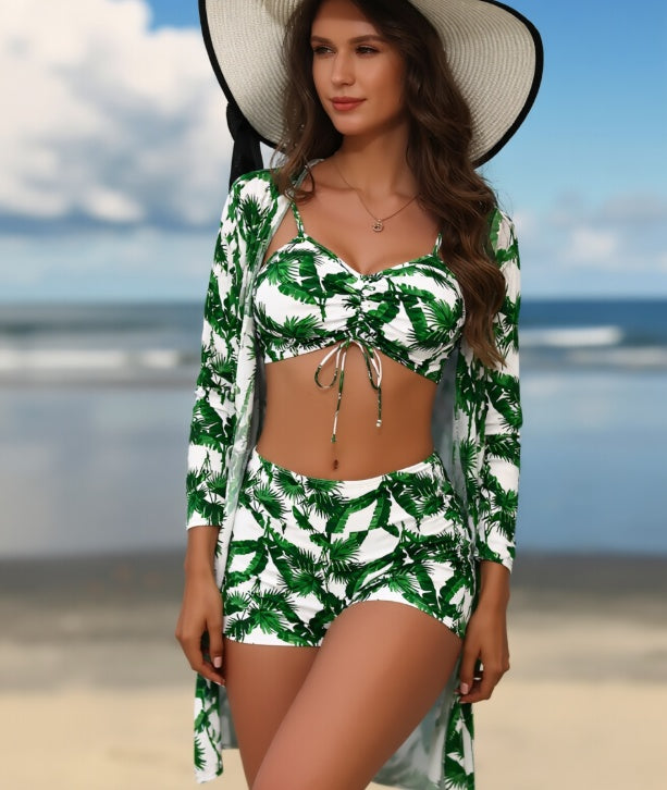 Women's 3-piece long sleeve swimsuit set by FitiqueFit featuring a stylish swimwear design with a full coverage top, bottom, and cover-up piece.