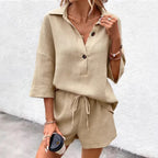 Women's notch-lapel short-sleeve top and belted shorts two-piece set by Plush Fashion Hub, shown in a stylish, coordinated outfit.
