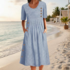 FitiqueFit button-down swing maxi dress with short sleeves, pockets, and a pullover design, flowing and stylish for casual wear.