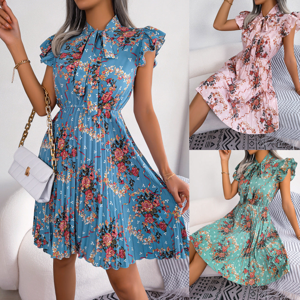 Dignified Flowers lace-up waist pleated maxi skirt by FitiqueFit, casualwear with floral pattern and flowing fabric.