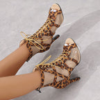 Plush Fashion Hub lace-up high heel sandals with open toe design and stylish straps, perfect for summer or formal wear.