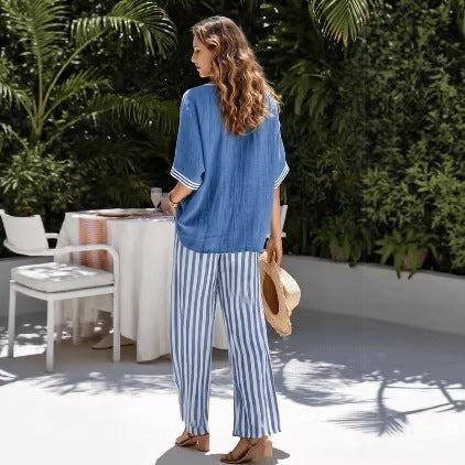 Women's striped tunic top and casual trousers two-piece set by FitiqueFit, featuring a relaxed fit and stylish stripes.