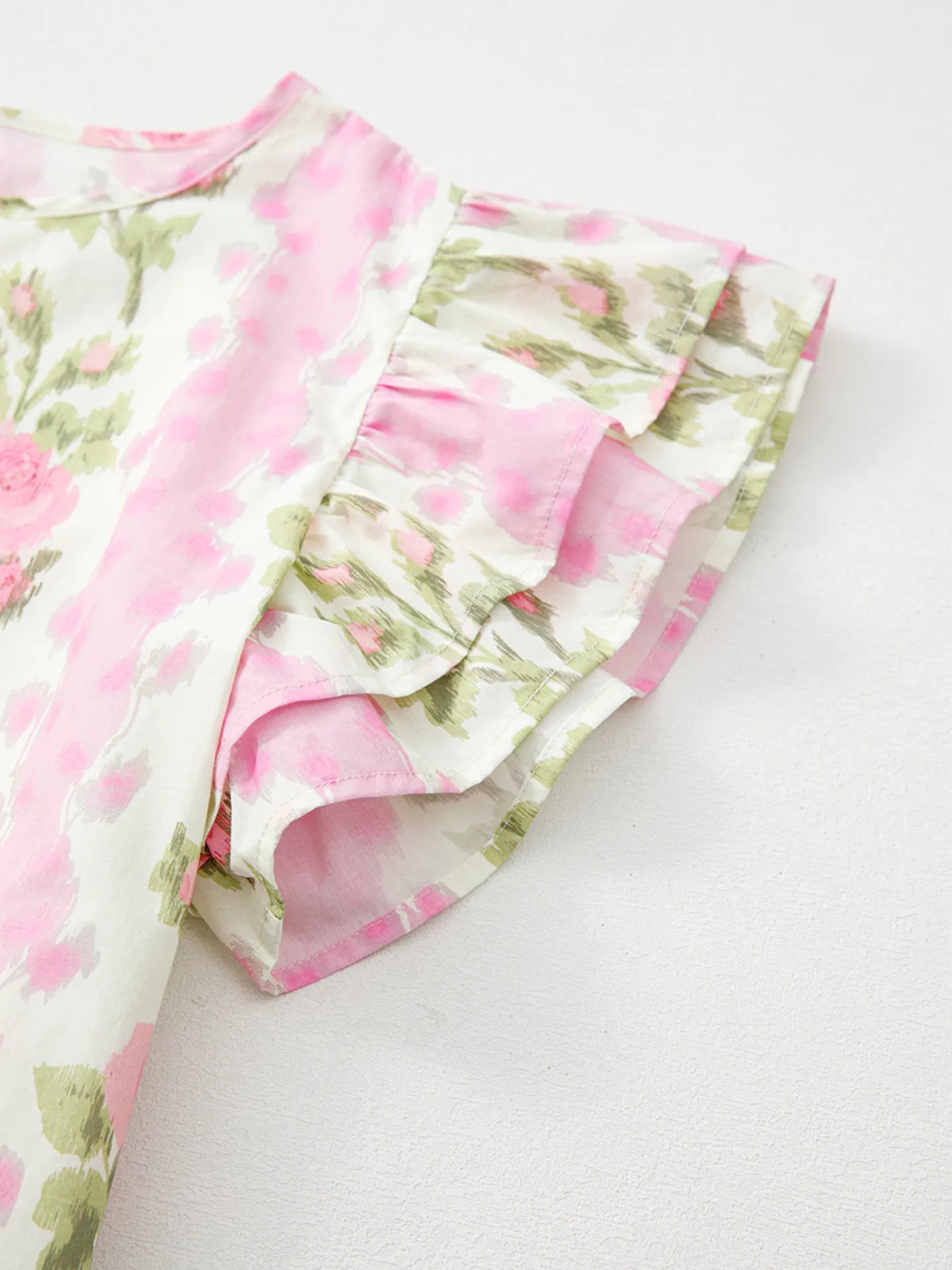 Floral print ruffled sleeve blouse from Plush Fashion Hub featuring a lightweight fabric and feminine design.