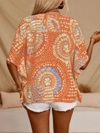 Women's printed V-neck half sleeve casual top by Plush Fashion Hub, soft stretch fabric, perfect for office or casual wear.