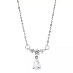 Sterling silver zircon teardrop necklace with a delicate chain and sparkling gemstone, showcasing elegant jewelry design.