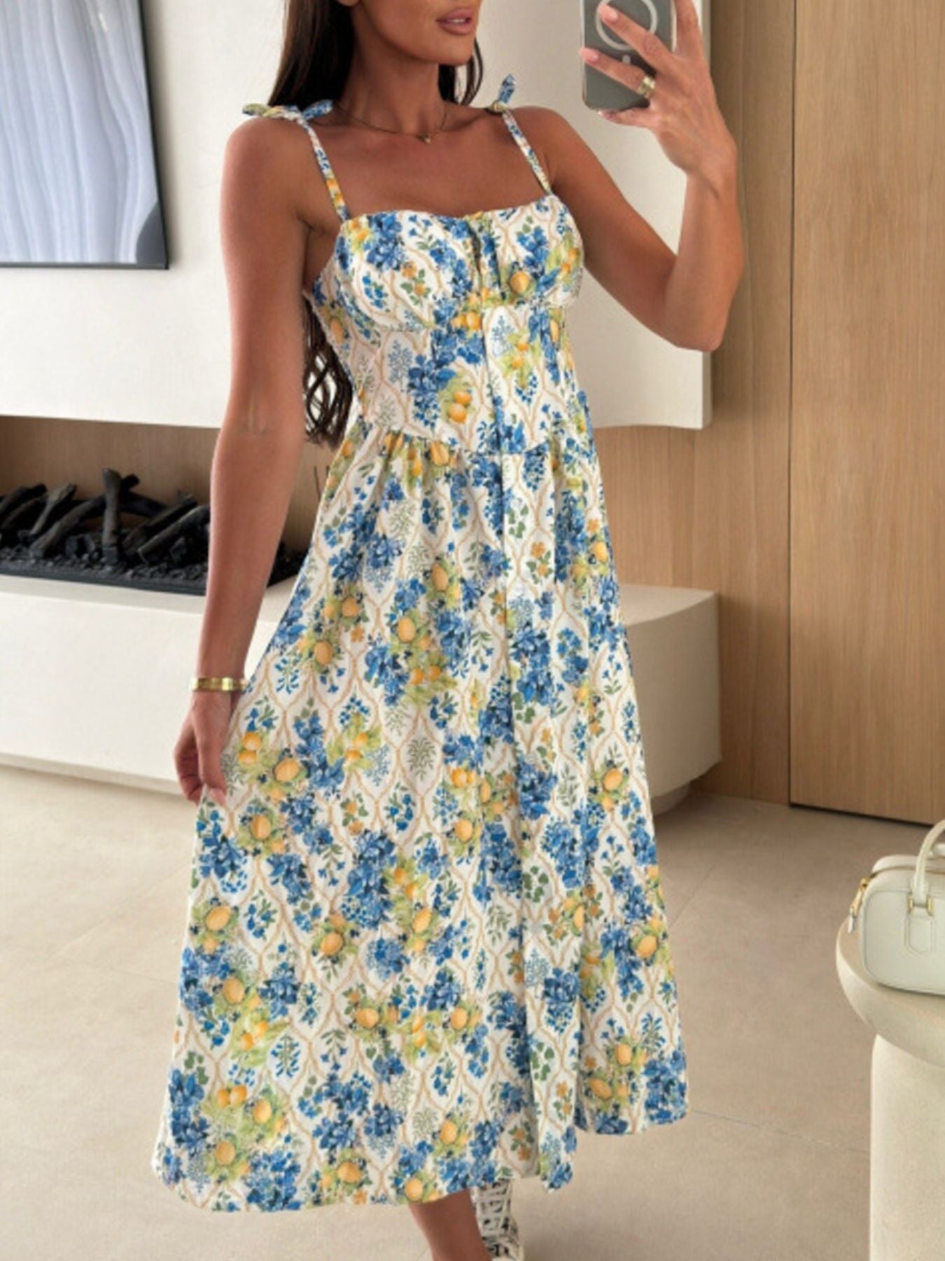 Women's striped tie-shoulder midi dress by Trendsi, casual summer brunch dress with a relaxed fit and stylish design.