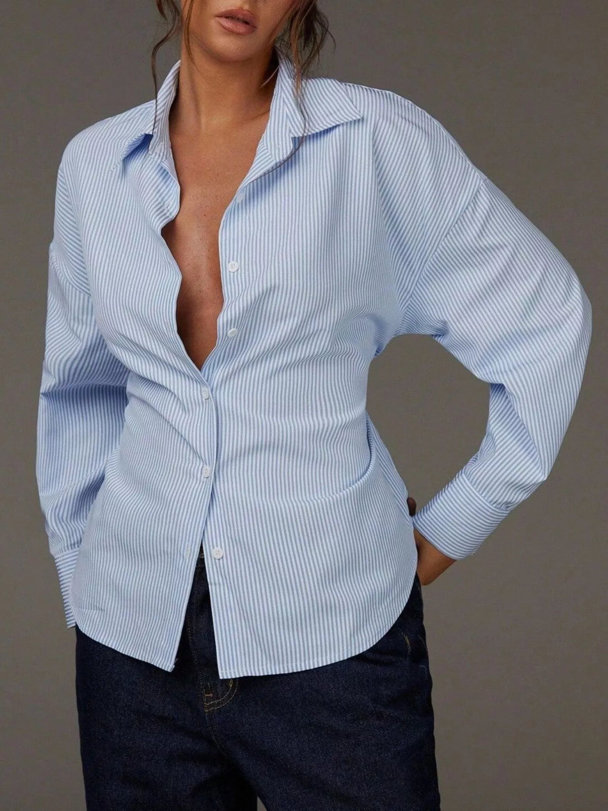 Casual striped button-down shirt from Trendsi with a classic collar and long sleeves, perfect for everyday wear.