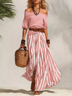 Off shoulder top and striped maxi skirt set by Shopimist featuring a stylish, casual summer look with flowing fabric and bold stripes.
