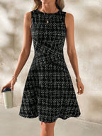 Shopimist round neck sleeveless dress with a fitted bodice and flowy skirt, perfect for casual or summer wear.