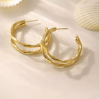 18K gold-plated chunky twisted hoop earrings with bold, twisted design, showcasing stylish jewelry from Shopimist.
