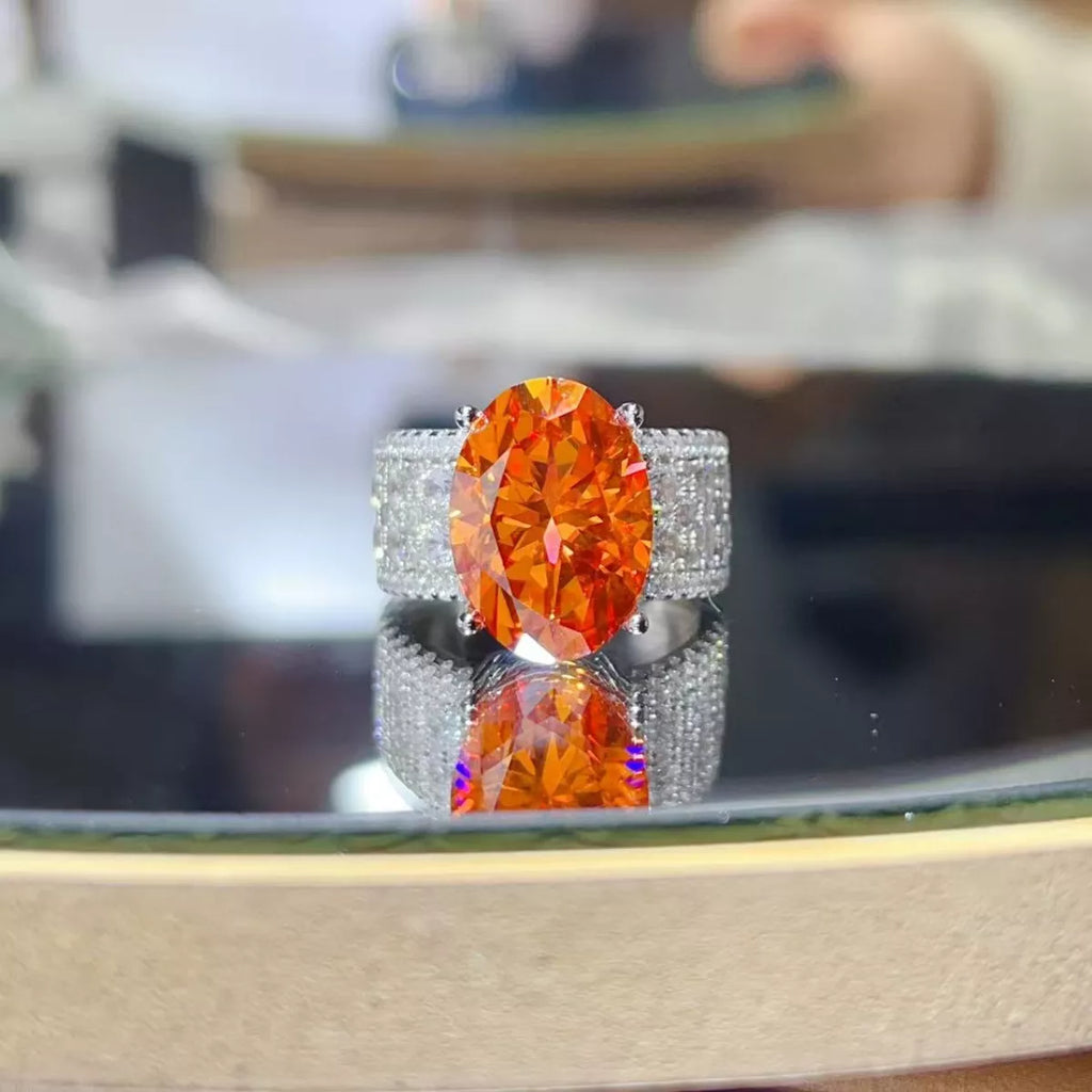 Sterling silver ring with an 8-carat moissanite gemstone, showcasing a sparkling, elegant jewelry design.