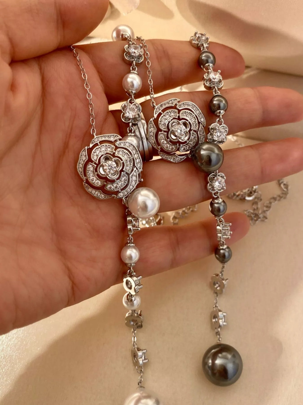 Pearl flower Y-necklace by Shopimist featuring white pearls and floral design on a delicate gold chain.