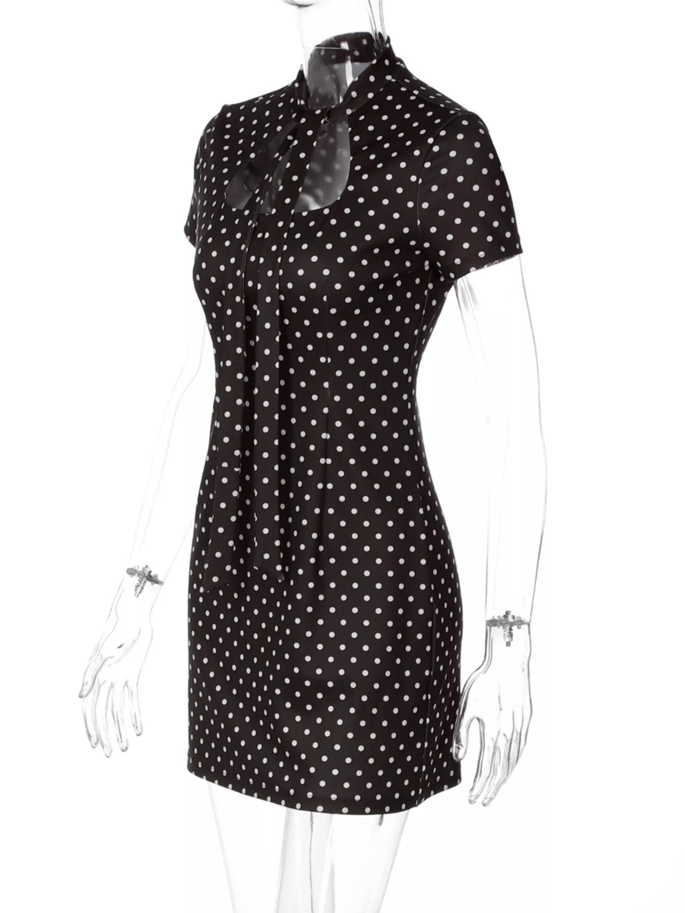 Polka dot cut-out front mini dress by Shopimist featuring a playful pattern and stylish design, perfect for trendy casual wear.
