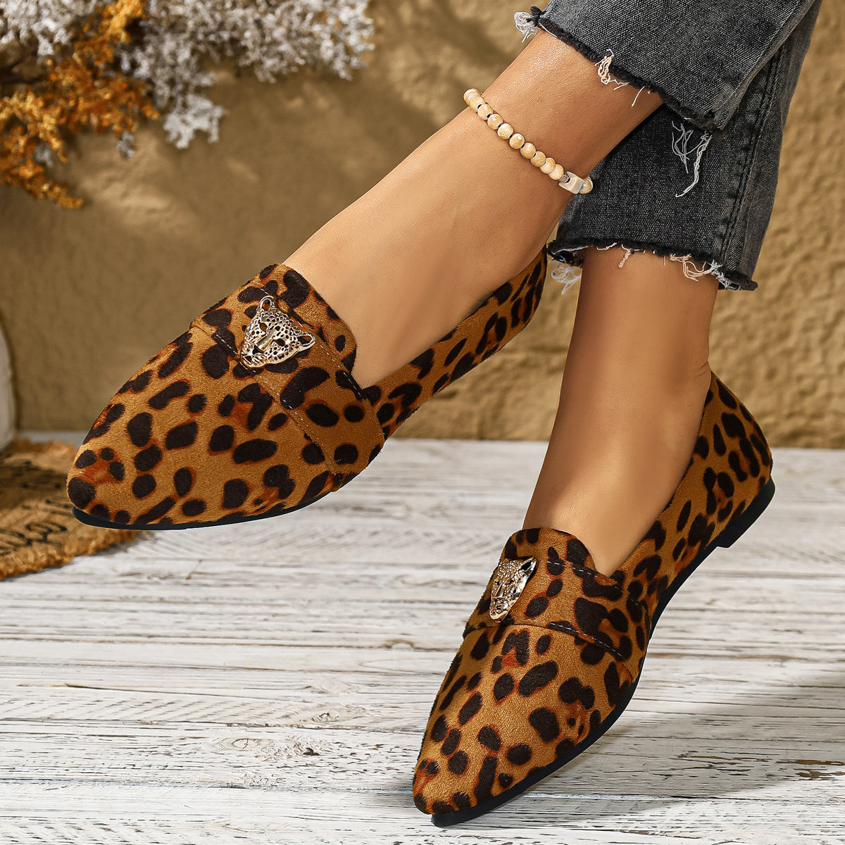 Point toe slip-on footwear by Trendsi featuring a sleek design and comfortable fit, ideal for stylish everyday wear.
