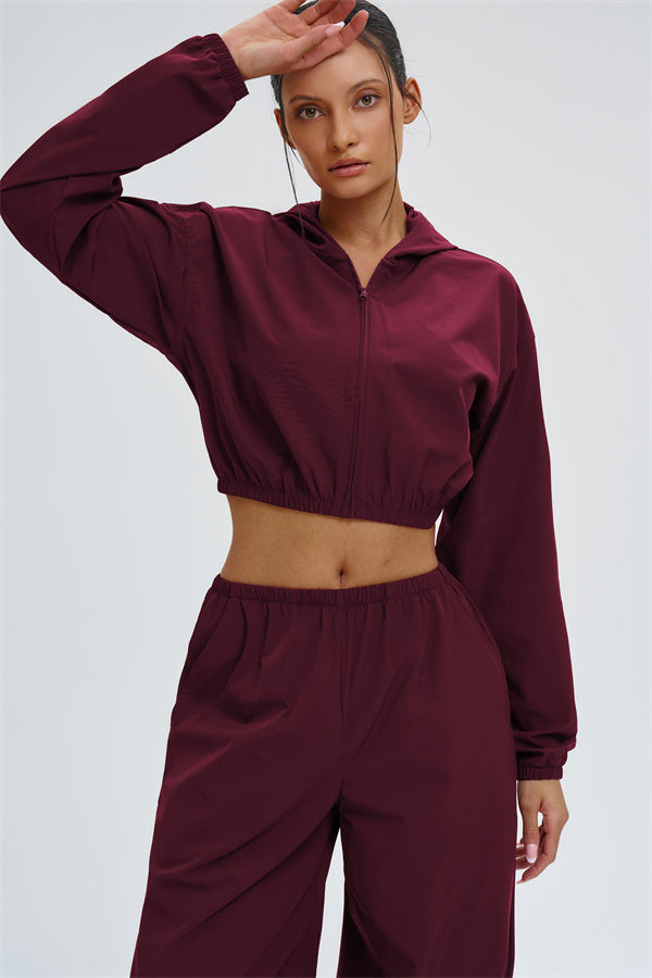 Svelte UV protection crop hoodie by Fitglutes Activewear featuring a fitted design and breathable fabric for activewear workouts.