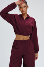 Svelte UV protection crop hoodie by Fitglutes Activewear featuring a fitted design and breathable fabric for activewear workouts.