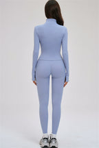 Fitglutes Activewear 3-piece set featuring a Kinetic Zip Jacket, Cross Back Sports Bra, and matching leggings for workout wear.