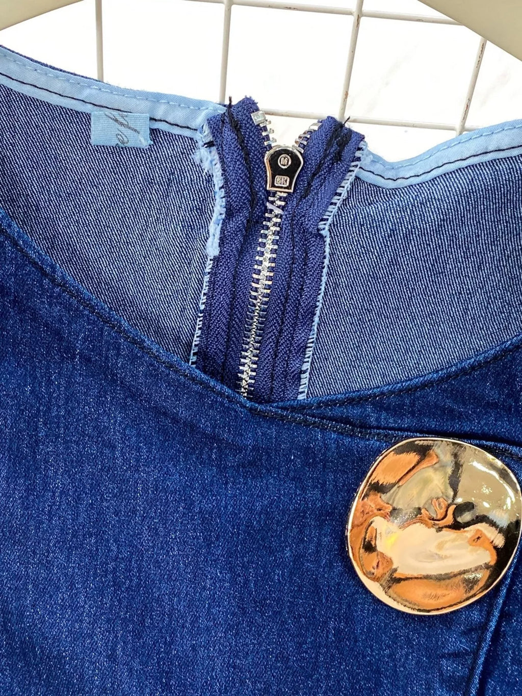 Button detail vest and flare jeans denim set by Shopimist, featuring a stylish denim vest with buttons and matching flared jeans.