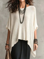 Plus size loose knit round neck top from Trendsi, featuring a cozy, full-size knit fabric and stylish round neckline.