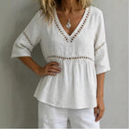 Women's V-neck hollow-out fringe cotton-linen top by FitiqueFit, casualwear with a stylish V-neck and textured fringe details.