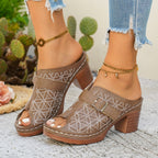 Women's chic buckle detail block heel sandals in premium faux leather, featuring stylish straps and a comfortable heel.