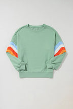 Contrast round neck long sleeve sweatshirt from Trendsi, casual top with a stylish design and comfortable fit.