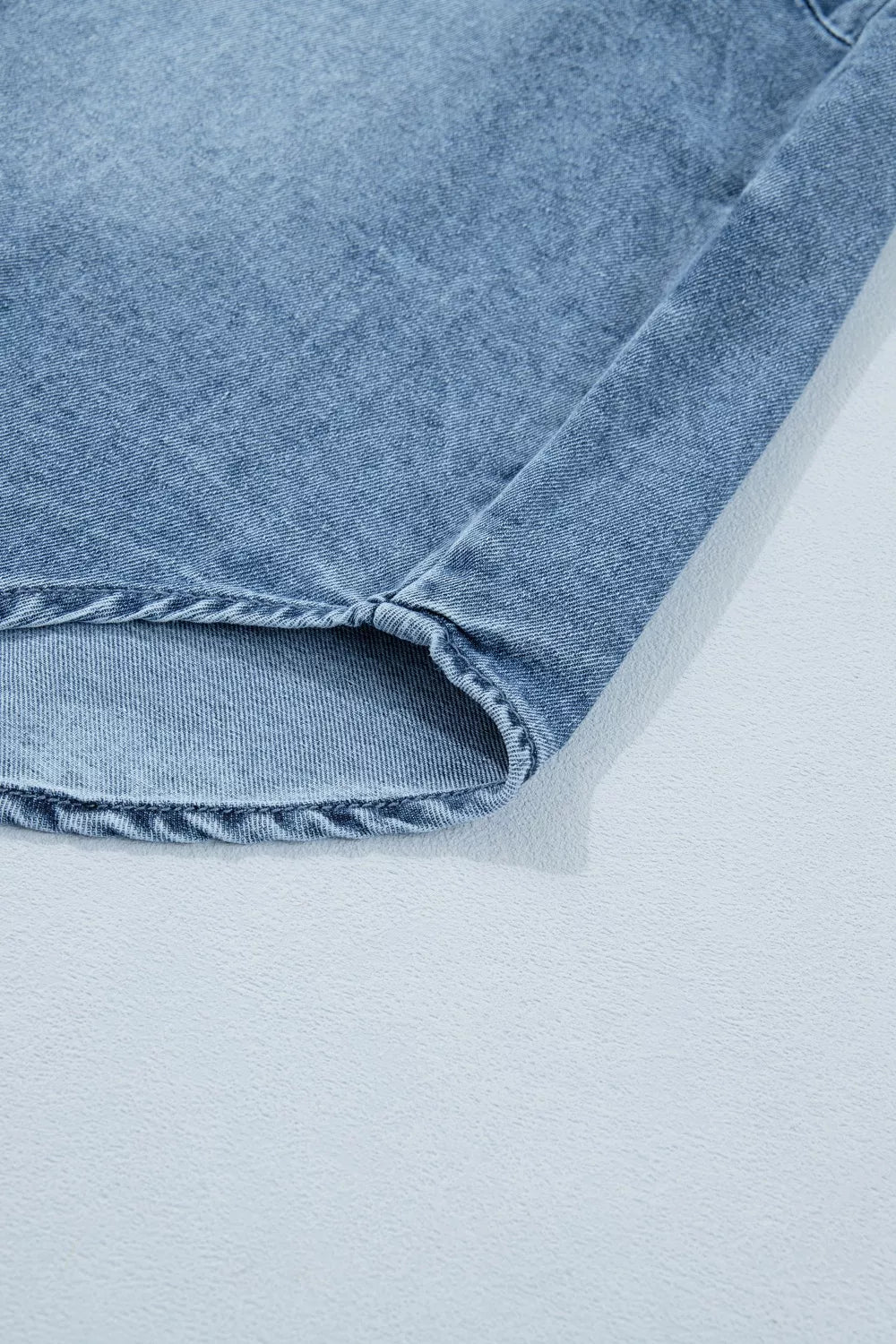 Plush Fashion Hub denim shirt with frilled short sleeves and snap buttons, casual style perfect for everyday wear.