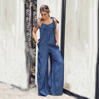 Women’s sleeveless wide-leg denim jumpsuit by Plush Fashion Hub, featuring a casual crew neck and relaxed fit in light denim fabric.