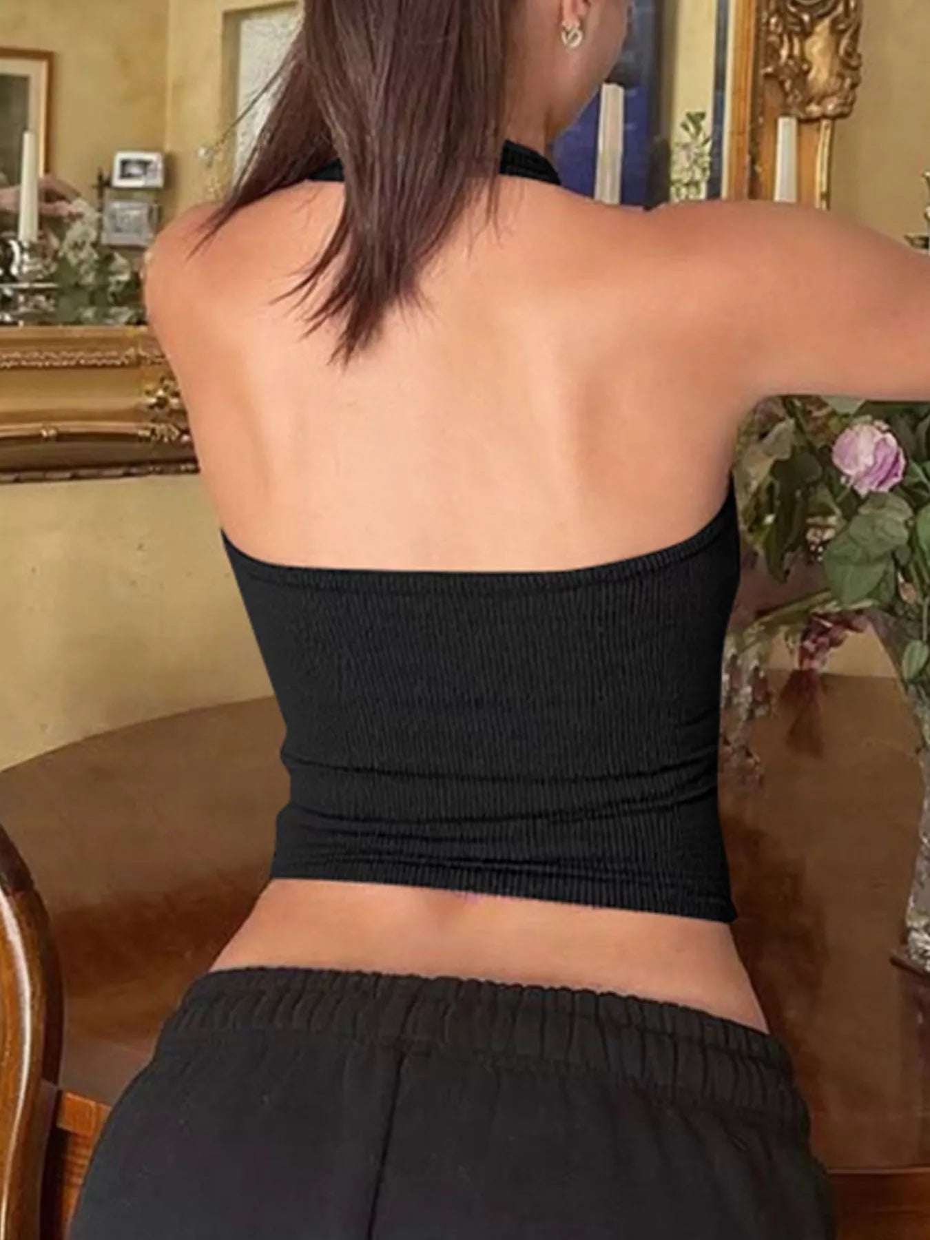 Ribbed halter neck tank top by Shopimist featuring a fitted design and sleeveless style, shown in a neutral color.