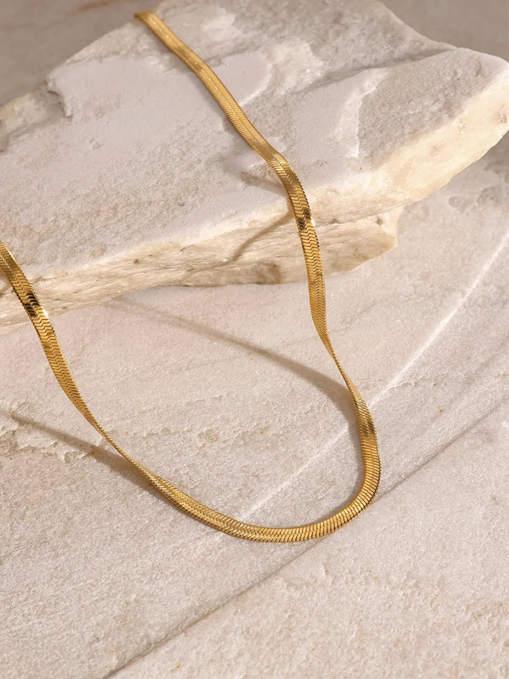 18K gold-plated three-layered cross necklace with intricate detailing, layered design, and chain links, by Shopimist.