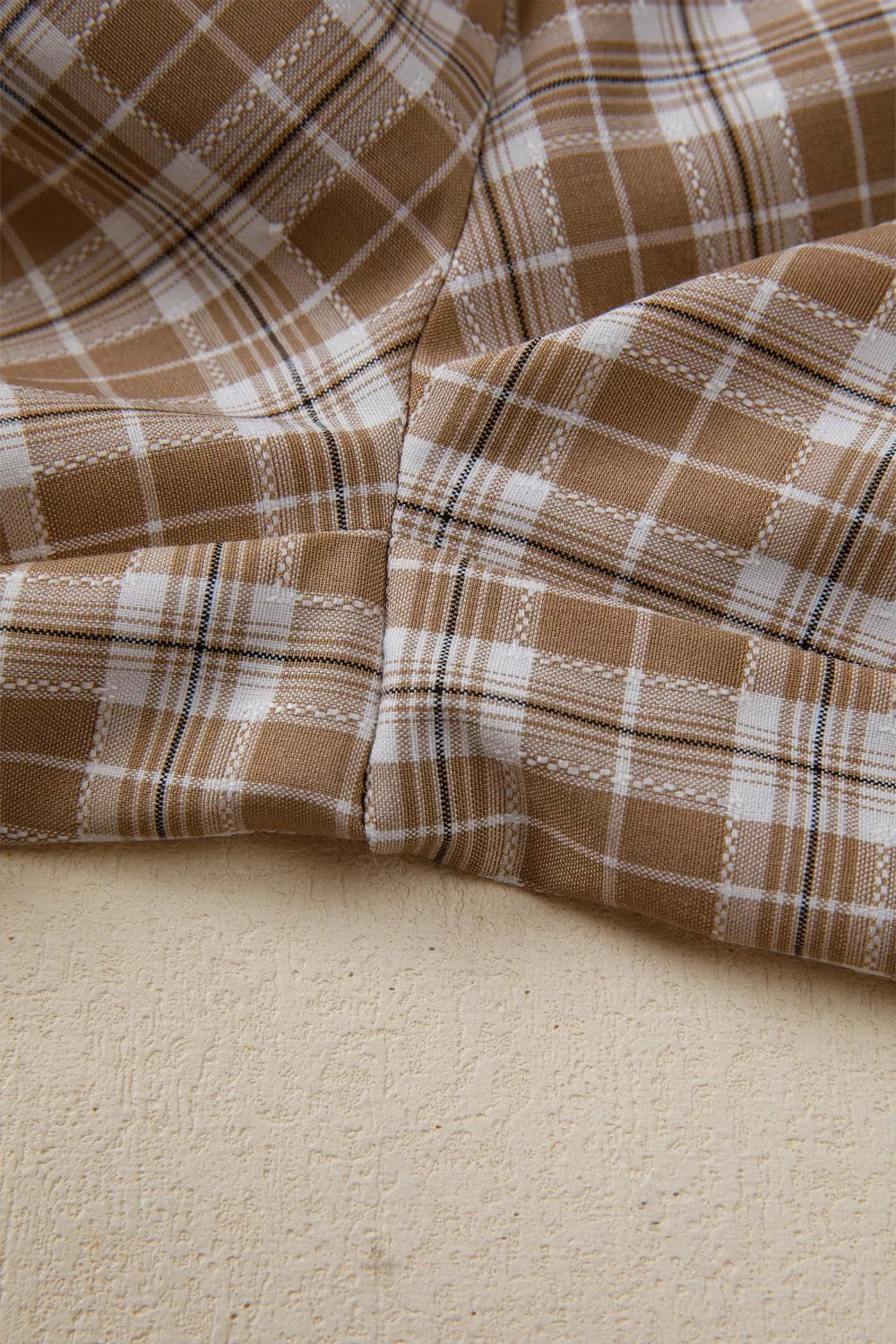 Plaid print casual pants with tie detail by Plush Fashion Hub, featuring a relaxed fit and stylish plaid pattern.