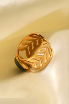 18k gold plated malachite leaf ring with intricate leaf design and vibrant green gemstone, stylish jewelry accessory.
