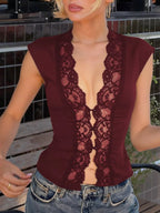 Lace trim button front vest by Shopimist featuring a delicate lace detail and a classic button-up design.