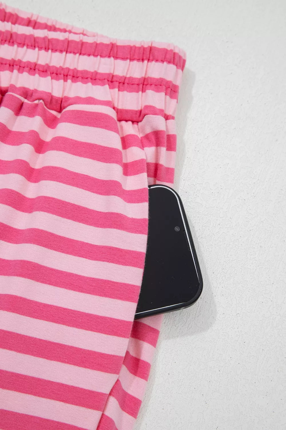 Stripe drop shoulder round neck top and buttoned straight pants two-piece set by Plush Fashion Hub, featuring stylish coordinated outfit.