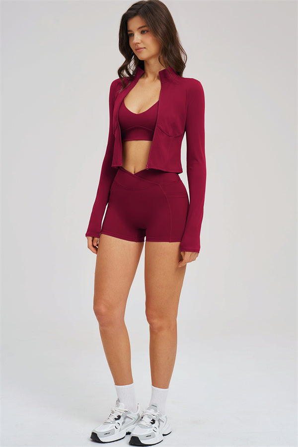 Fitglutes Activewear sports bra, zip jacket, and shorts 3-piece set for workout and gym activities, featuring a sleek athletic design.