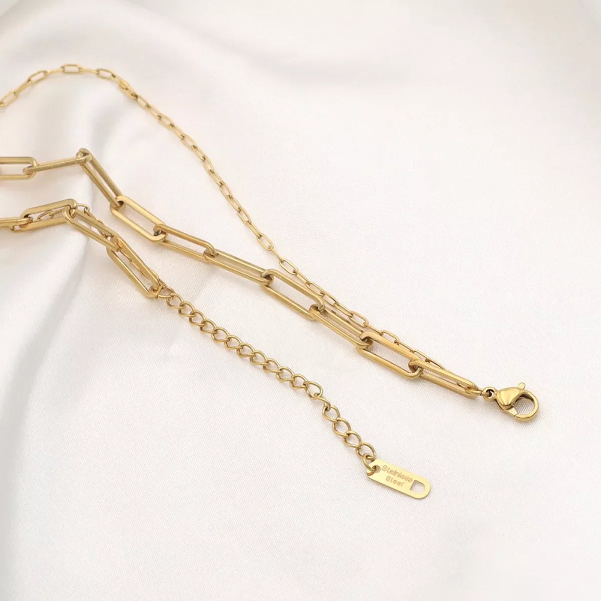 18K gold-plated double layered necklace from Plush Fashion Hub, featuring delicate chains and elegant design.