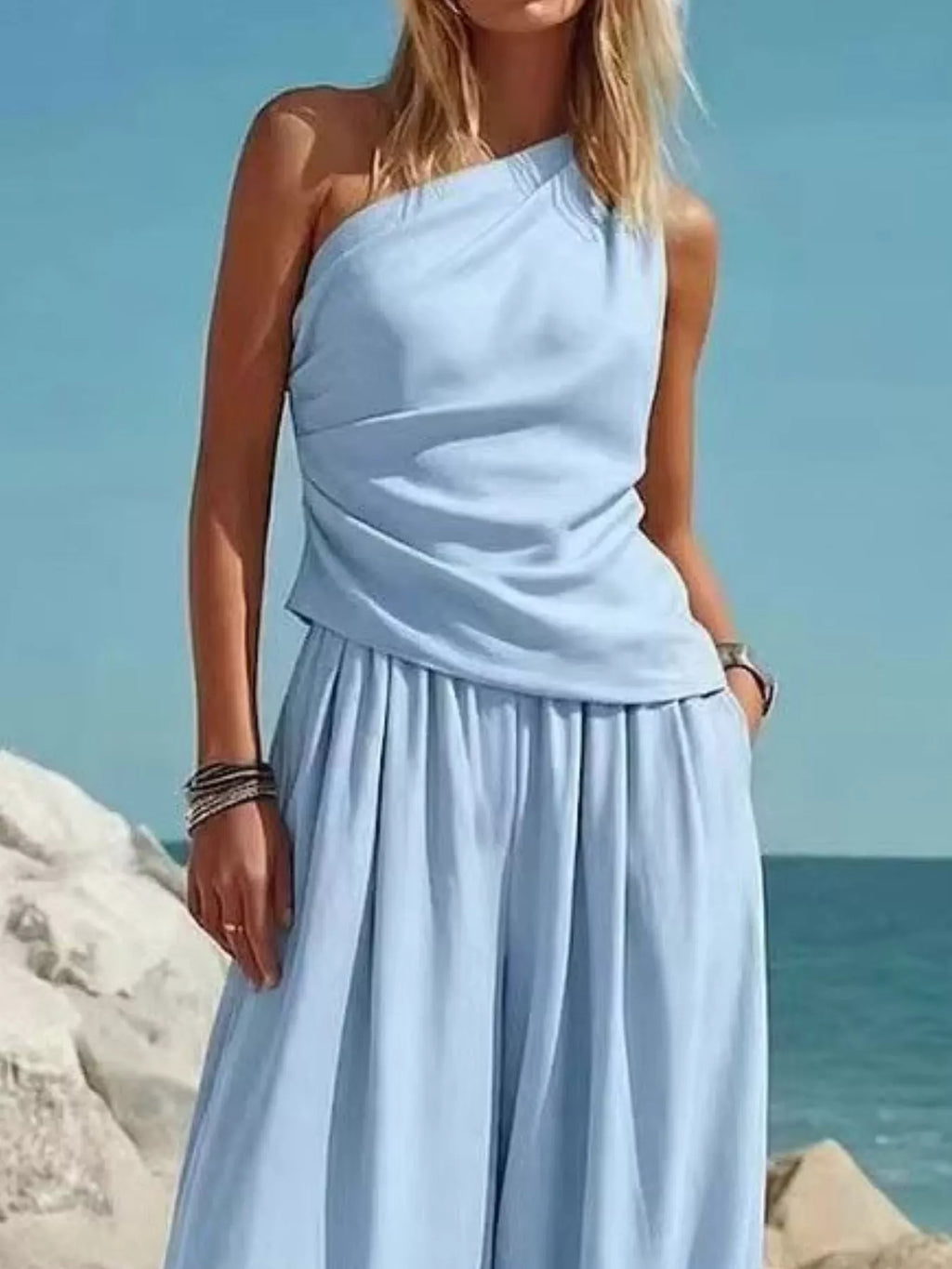 Plus size one-shoulder top and wide-leg pants set by Plush Fashion Hub, featuring a stylish matching piece pants set.