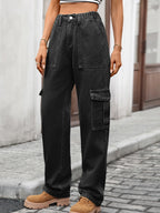 High-waisted cargo jeans from Plush Fashion Shop, featuring denim material, multiple pockets, and a modern relaxed fit.