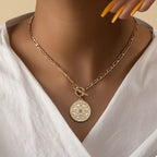 Chain link necklace from Shopimist featuring a vintage coin pendant, showcasing a stylish and unique jewelry accessory.