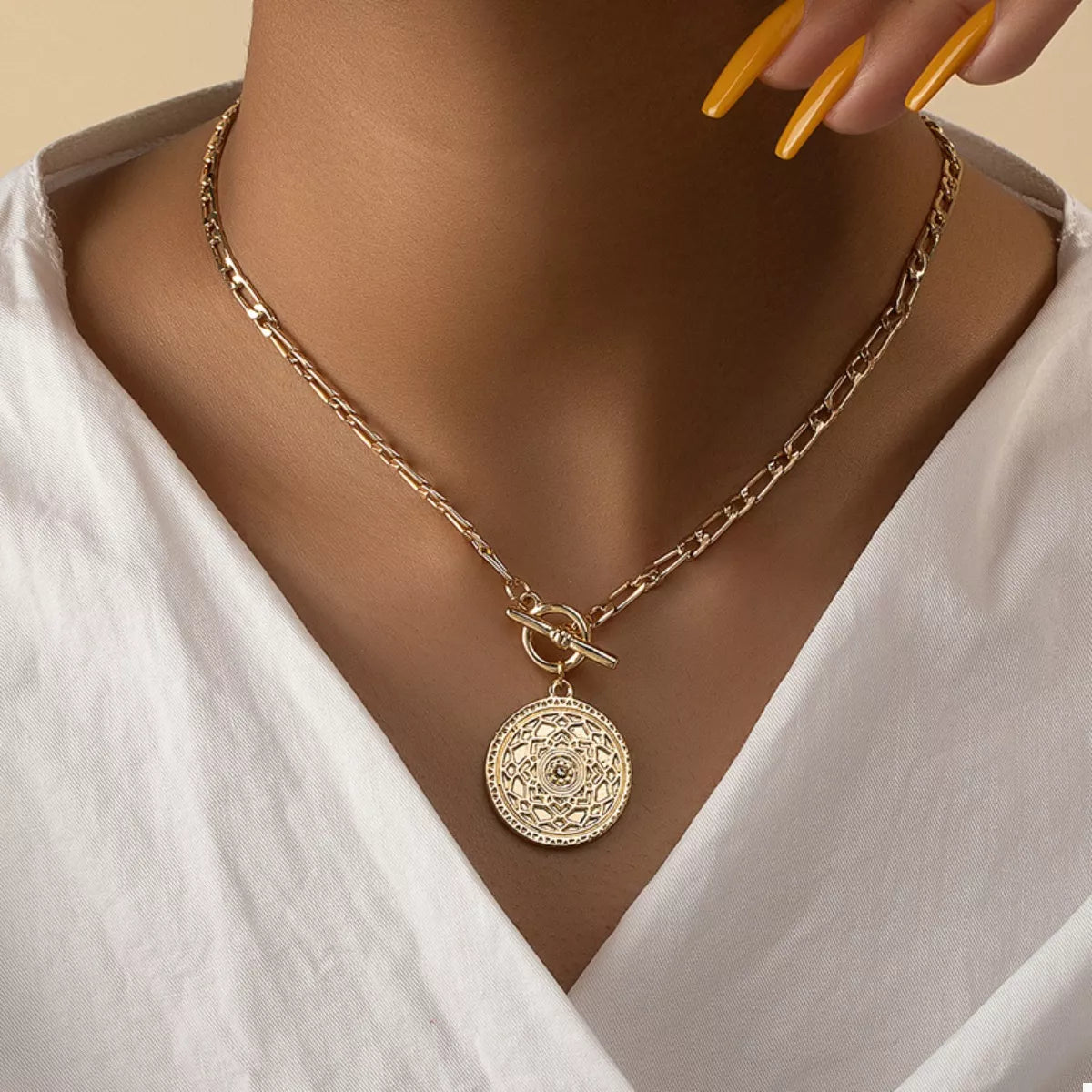Vintage coin pendant chain link necklace from Plush Fashion Hub featuring a detailed coin charm on a classic metal chain.