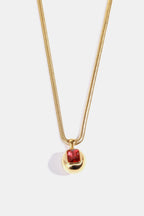 Gold-plated Zircon geometrical shape pendant necklace with sleek design, showcasing a modern jewelry piece.