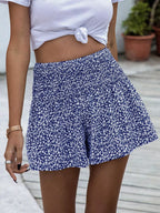 Floral print elastic waist shorts from Trendsi, featuring a vibrant floral pattern and comfortable fit, perfect for casual wear.