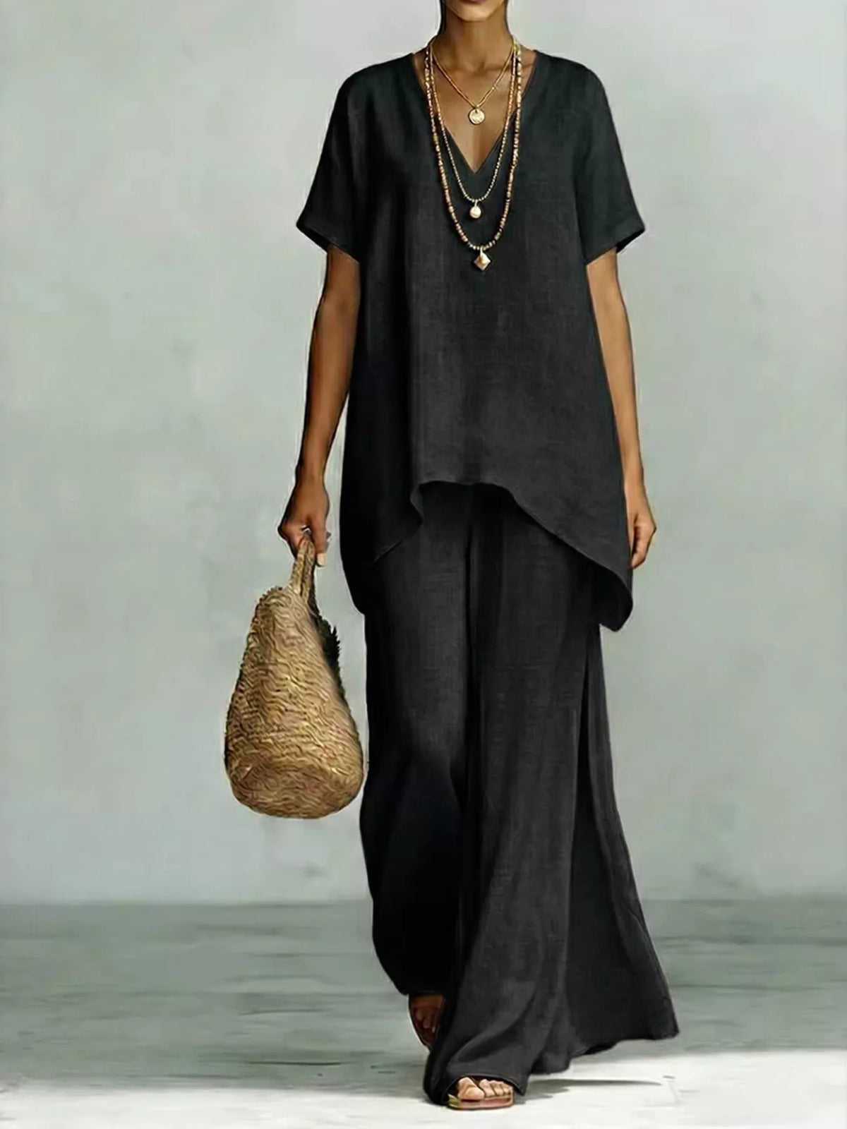 Plus size V-neck top and wide-leg pants set by Plush Fashion Hub, stylish and comfortable two-piece outfit for full-size women.