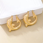 18K gold-plated dolphin hoop earrings from Shopimist with detailed dolphin design and shiny finish, perfect for stylish accessories.