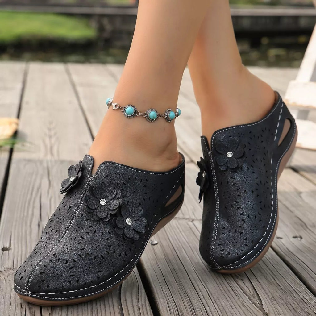 Shopimist floral decor round toe sandals featuring colorful flower accents and comfortable flat soles.