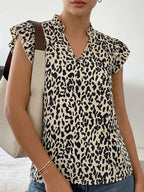 Leopard print ruffle sleeve blouse from Plush Fashion Hub, stylish women's top with bold animal pattern and ruffled details.
