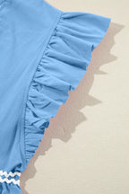 Cotton ruffled notched cap sleeve mini dress by Trendsi featuring a fitted silhouette and delicate ruffle details.